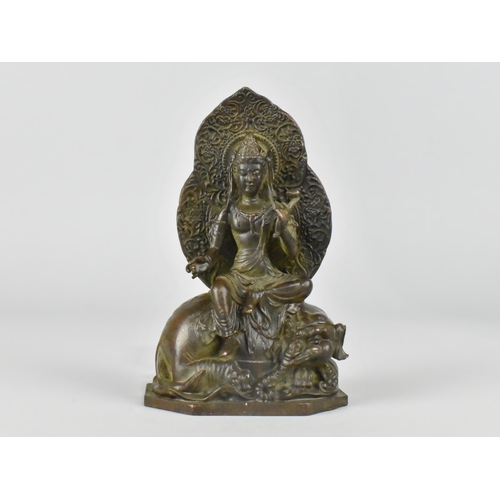 61 - A Chinese Patinated Bronze Figure of A Buddhist Bodhisattva Sat on Reclining Elephant, 11.5cms High