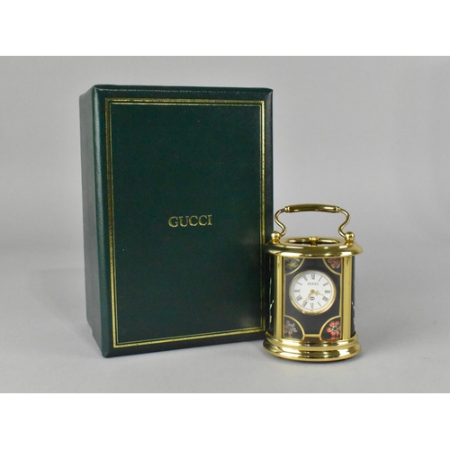9 - A Boxed Gucci Miniature Carriage Clock By Halcyon Days, 8cms High
