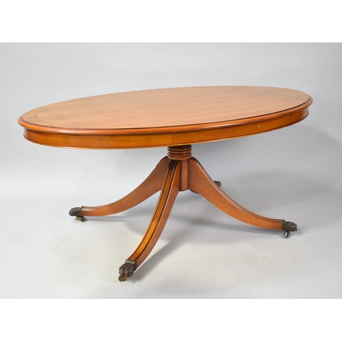 181 - A Late 20th Century Oval Yew Wood Coffee Table, 115cms Wide