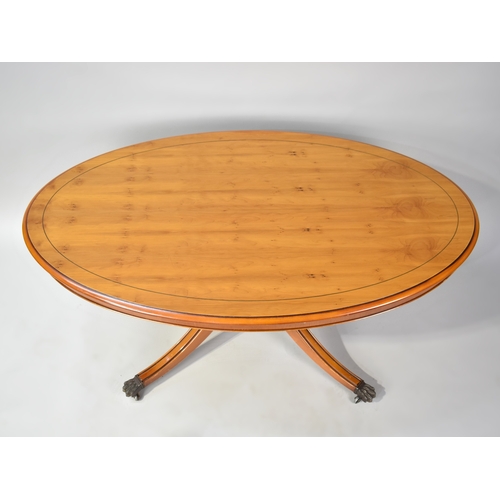 181 - A Late 20th Century Oval Yew Wood Coffee Table, 115cms Wide