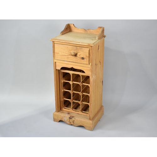 197 - A Modern Pine Wine Cabinet with Top Drawer and Gallery and Removable Wine Rack, 39cms Wide