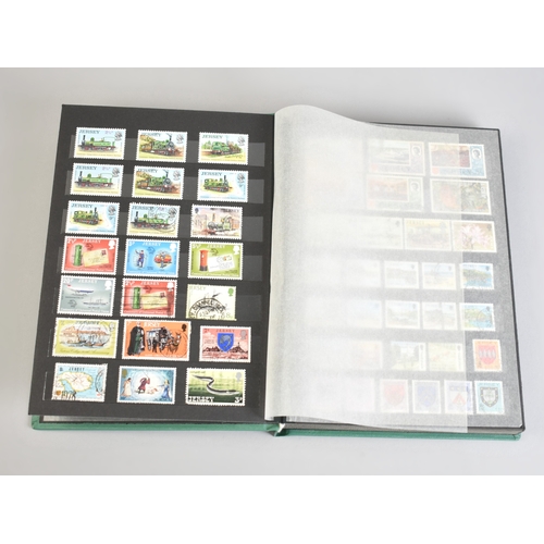 212 - A Stamp Stock Book Containing Channel Island Stamps for Jersey, Guernsey and Alderney