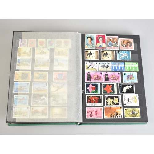 212 - A Stamp Stock Book Containing Channel Island Stamps for Jersey, Guernsey and Alderney