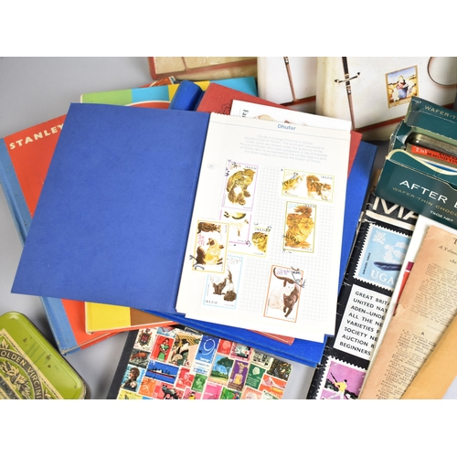213 - A Collection of Eight Stamp Albums and Contents, Loose Stamps, Books on Stamps, PHQ Cards Etc