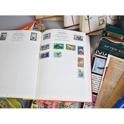 213 - A Collection of Eight Stamp Albums and Contents, Loose Stamps, Books on Stamps, PHQ Cards Etc