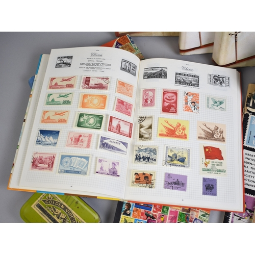213 - A Collection of Eight Stamp Albums and Contents, Loose Stamps, Books on Stamps, PHQ Cards Etc