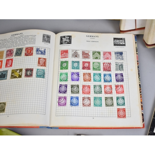 213 - A Collection of Eight Stamp Albums and Contents, Loose Stamps, Books on Stamps, PHQ Cards Etc