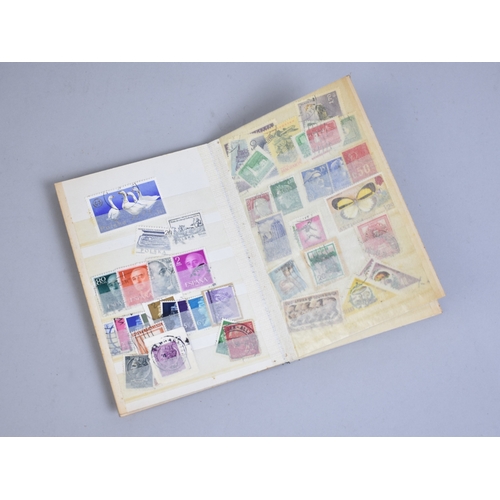 213 - A Collection of Eight Stamp Albums and Contents, Loose Stamps, Books on Stamps, PHQ Cards Etc