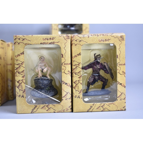 237 - A Large Collection of New Line Cinema Boxed Lord Of The Rings Figures and Fourteen Stands