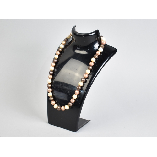 A 14ct Gold Mounted String of Pearls, Various Colours, 45cms Long