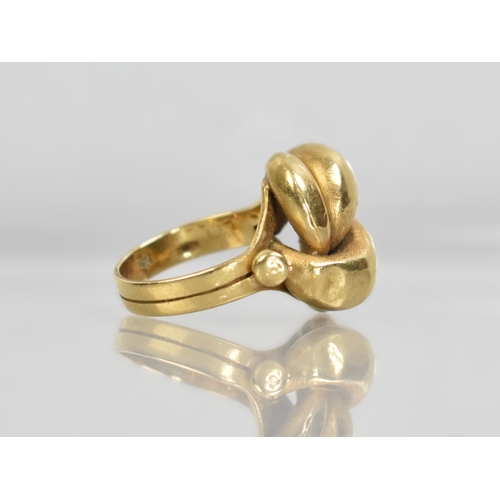 1 - An Eastern 18ct Gold Knot Ring, 6.9gms, Stamped 750 to the Interior, Size J.5