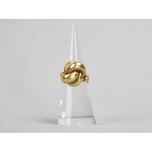 1 - An Eastern 18ct Gold Knot Ring, 6.9gms, Stamped 750 to the Interior, Size J.5