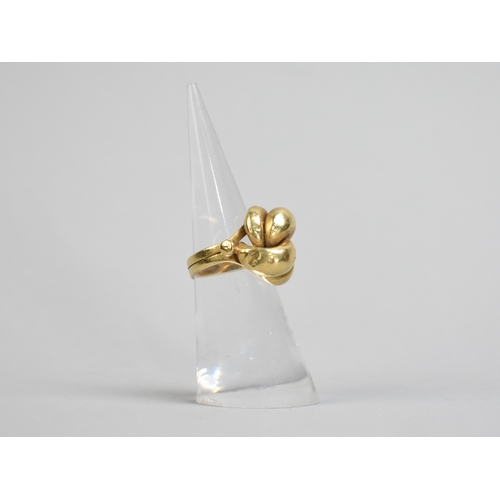 1 - An Eastern 18ct Gold Knot Ring, 6.9gms, Stamped 750 to the Interior, Size J.5