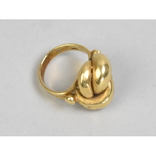 1 - An Eastern 18ct Gold Knot Ring, 6.9gms, Stamped 750 to the Interior, Size J.5