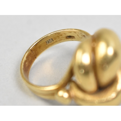 1 - An Eastern 18ct Gold Knot Ring, 6.9gms, Stamped 750 to the Interior, Size J.5