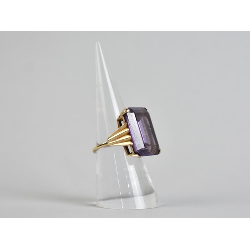 14 - A 9ct Gold Synthetic Alexandrite Ring, Rectangular Step Cut and Measuring 20x15mm, Set in Four Flatt... 