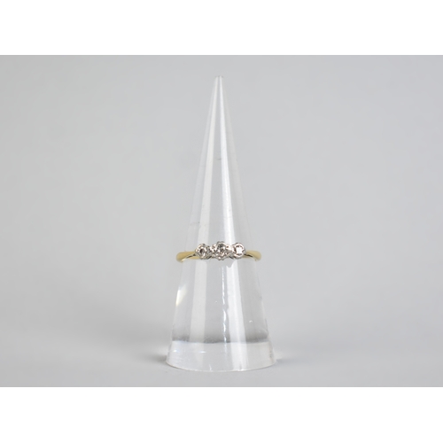 17 - An 18ct Gold, Diamond and Platinum Trilogy Ring, Central Round Cut Stone Measuring 2.4mm Diameter Su... 
