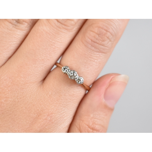 17 - An 18ct Gold, Diamond and Platinum Trilogy Ring, Central Round Cut Stone Measuring 2.4mm Diameter Su... 
