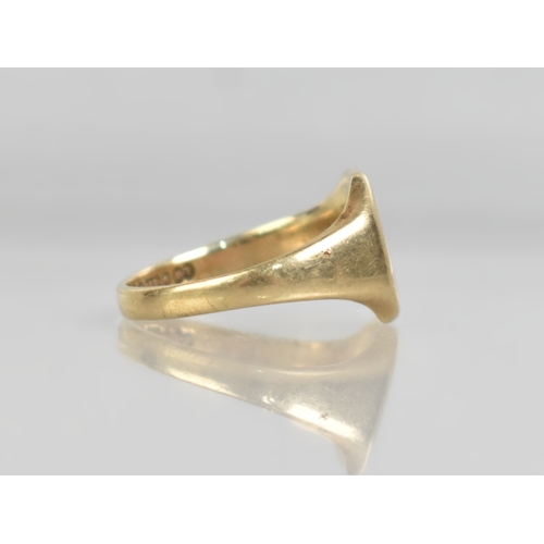 23 - A 9ct Gold Signet Ring, Octagonal Head to Tapered Fluted Shoulders and a Polished Flattened Band, Si... 