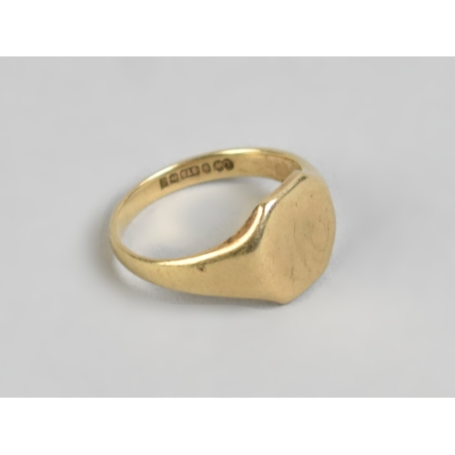 23 - A 9ct Gold Signet Ring, Octagonal Head to Tapered Fluted Shoulders and a Polished Flattened Band, Si... 