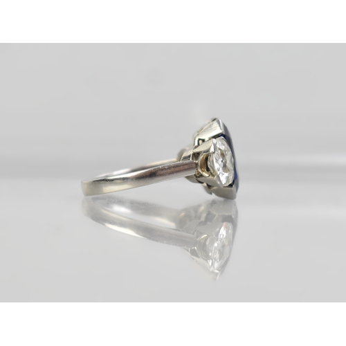 6 - An Art Deco Sapphire, Diamond and Platinum Trilogy Ring, Central Step Cut Sapphire Measuring 11.8mm ... 