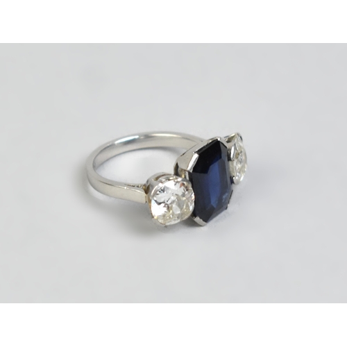 6 - An Art Deco Sapphire, Diamond and Platinum Trilogy Ring, Central Step Cut Sapphire Measuring 11.8mm ... 