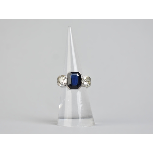 6 - An Art Deco Sapphire, Diamond and Platinum Trilogy Ring, Central Step Cut Sapphire Measuring 11.8mm ... 