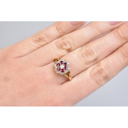26 - An Edwardian Ruby, Diamond and 18ct Gold Three Layer Cluster Ring Comprising Central Round Cut Grain... 