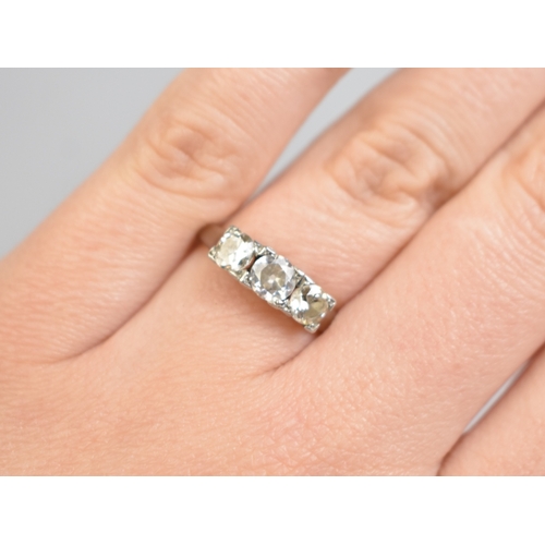28 - An 18ct Gold, Platinum and Diamond Trilogy Ring, Central Round Brilliant Cut Stone Measuring 4.5mm D... 