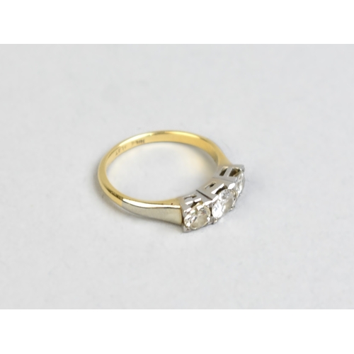 28 - An 18ct Gold, Platinum and Diamond Trilogy Ring, Central Round Brilliant Cut Stone Measuring 4.5mm D... 