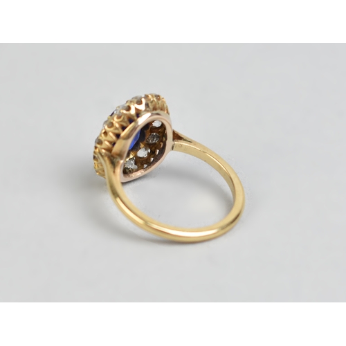 30 - An Impressive Vivid Blue Garnet Topped Doublet and Diamond Ring, Central Mixed Oval Cut Stone Measur... 