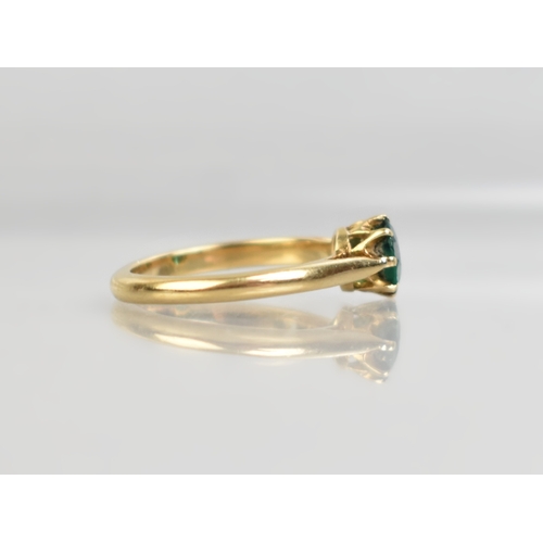 32 - A Green Paste Garnet Topped Doublet, Round Mixed Cut Stone Measuring 5.9mm Diameter Set in Four Claw... 