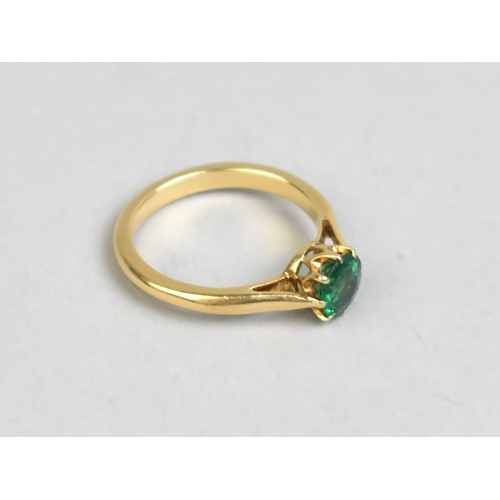 32 - A Green Paste Garnet Topped Doublet, Round Mixed Cut Stone Measuring 5.9mm Diameter Set in Four Claw... 