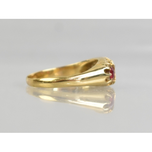 35 - A Ruby and Diamond Boat Shape Ring (One Coloured Side Stone is Replacement Paste), Central Mixed Cus... 