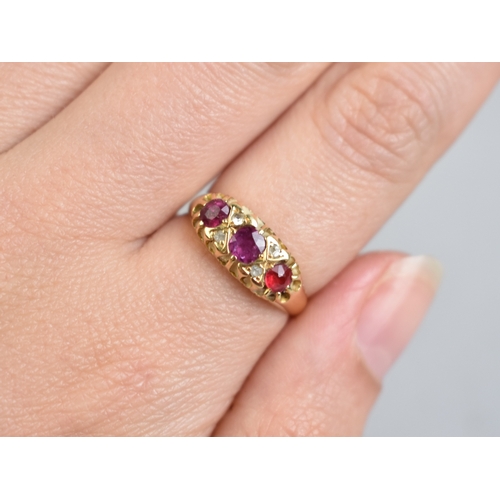 35 - A Ruby and Diamond Boat Shape Ring (One Coloured Side Stone is Replacement Paste), Central Mixed Cus... 