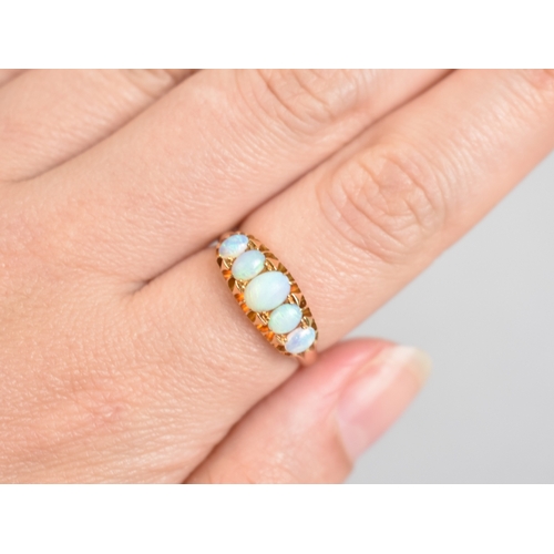 37 - An Antique Opal and 18ct Gold Ring, Graduated Oval Cabochon Stones with the Largest Measuring 5.7mm ... 