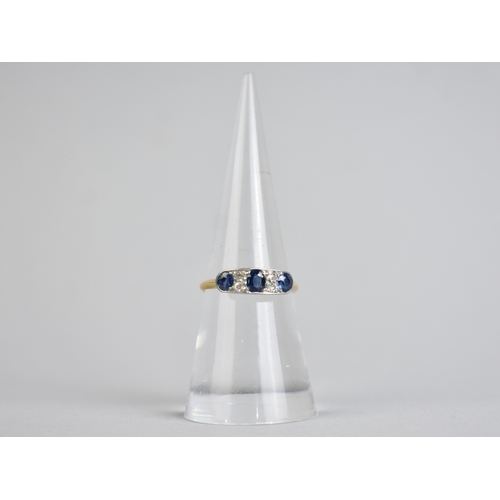 5 - An Early 20th Century 18ct Gold, Sapphire and Diamond Ring, Primary Mixed Oval Cut Stone Measuring 4... 