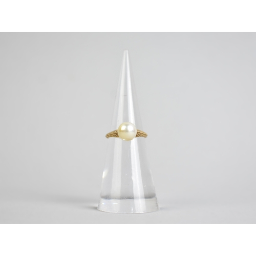 47 - An American 10ct Gold and Simulated Pearl Ring with Engraved Band together with a Simulated Pearl an... 