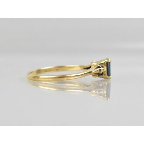 48 - A Sapphire Doublet Ladies Dress Ring, Emerald Cut Stone Measuring 4mm by 6mm Raised in Four Claws to... 