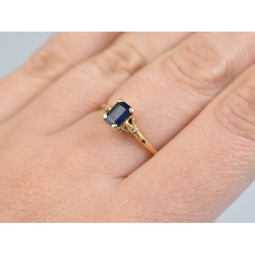48 - A Sapphire Doublet Ladies Dress Ring, Emerald Cut Stone Measuring 4mm by 6mm Raised in Four Claws to... 