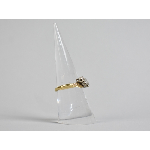 52 - An 18ct Gold and Platinum Mounted Diamond Trilogy Ring, Primary Round Cut Stone Set in Ten Claws and... 