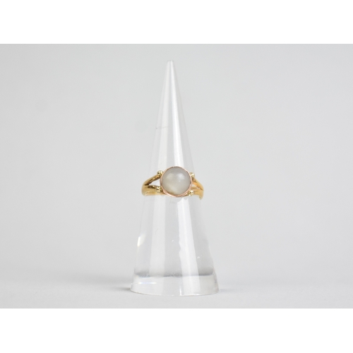 54 - An Antique White Stone Cabochon Ring Mounted in Gold Metal on a 22ct Gold Band, Bezel Set Circular C... 