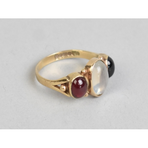 55 - An Antique Style Moonstone and Almandine-Pyrope Garnet Ring, Bezel Set Central Moonstone Cabochon Me... 