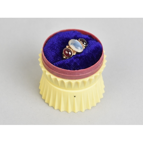 55 - An Antique Style Moonstone and Almandine-Pyrope Garnet Ring, Bezel Set Central Moonstone Cabochon Me... 