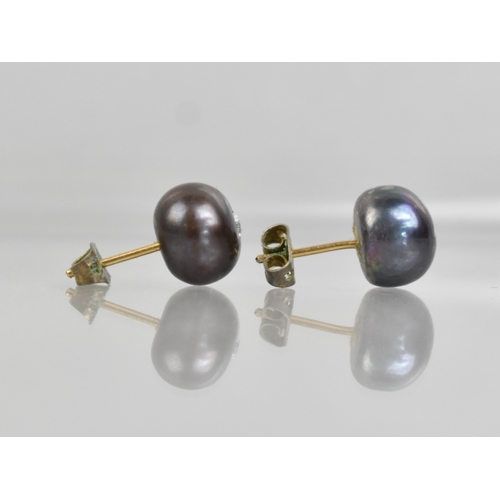 56 - A Pair of Pearl and Diamond Set Stud Earrings, Central Diamond Measuring 2.8mm Diameter Approx, Pear... 