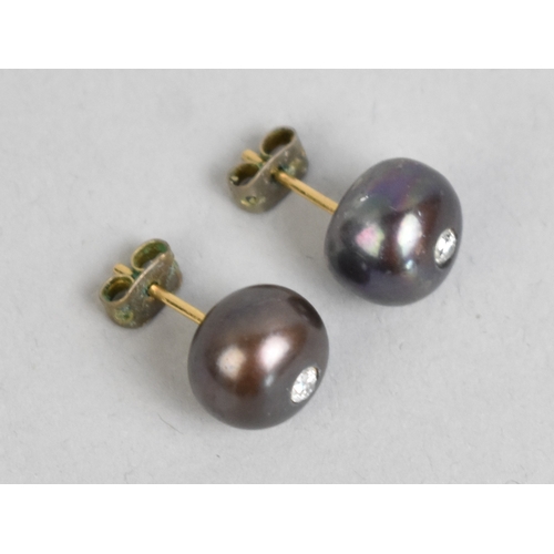 56 - A Pair of Pearl and Diamond Set Stud Earrings, Central Diamond Measuring 2.8mm Diameter Approx, Pear... 