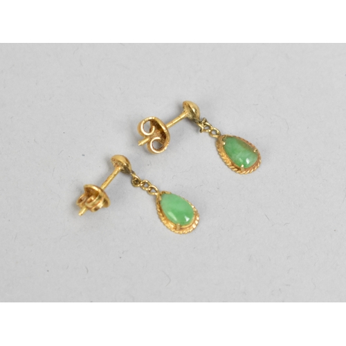 58 - A Pair of Jadeite Cabochon and High Carat Gold Earrings, Pear Shaped Cabochons Measuring 7.6mm by 4.... 