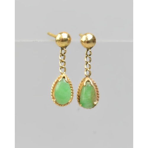 58 - A Pair of Jadeite Cabochon and High Carat Gold Earrings, Pear Shaped Cabochons Measuring 7.6mm by 4.... 