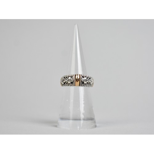 41 - An 18ct Gold Mounted Silver Ring by Suarti with Cannatille and Polished Decoration, Size K.5, 5.6gms