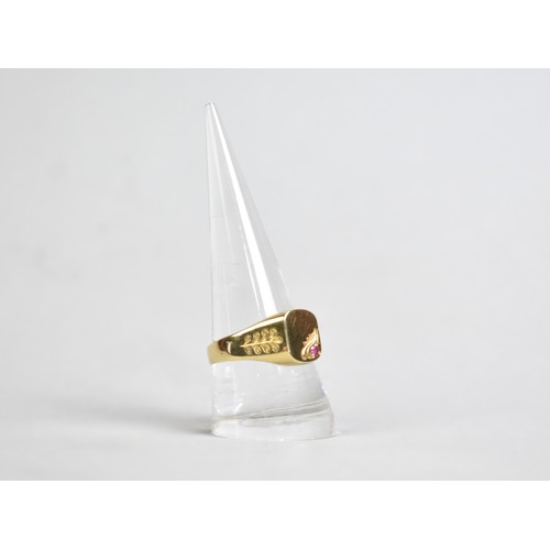 23A - A 14ct Gold and Ruby Signet Ring, Rectangular Head with Round Cut Grain Set Ruby, Engraved Shoulders... 